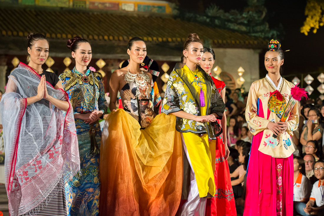 Beautiful Vietnamese models wearing classical Asian costumes during the Oriental Night at Hue Festival 2014, Thua ThienâHue Province, Viet Nam, Indochina, South East Asia.