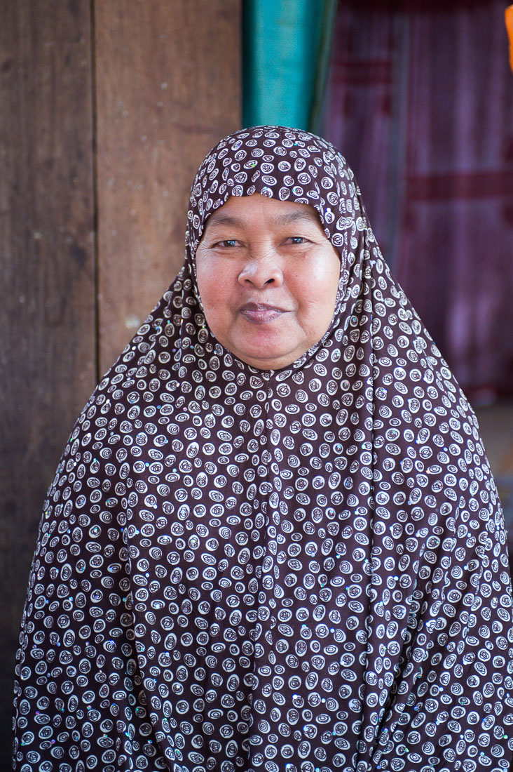 Old Cham Muslim woman wearing her hijab, happily smiling, Sen Monorom, Mondulkiri province. Kingdom of Cambodia, Indochina, South East Asia