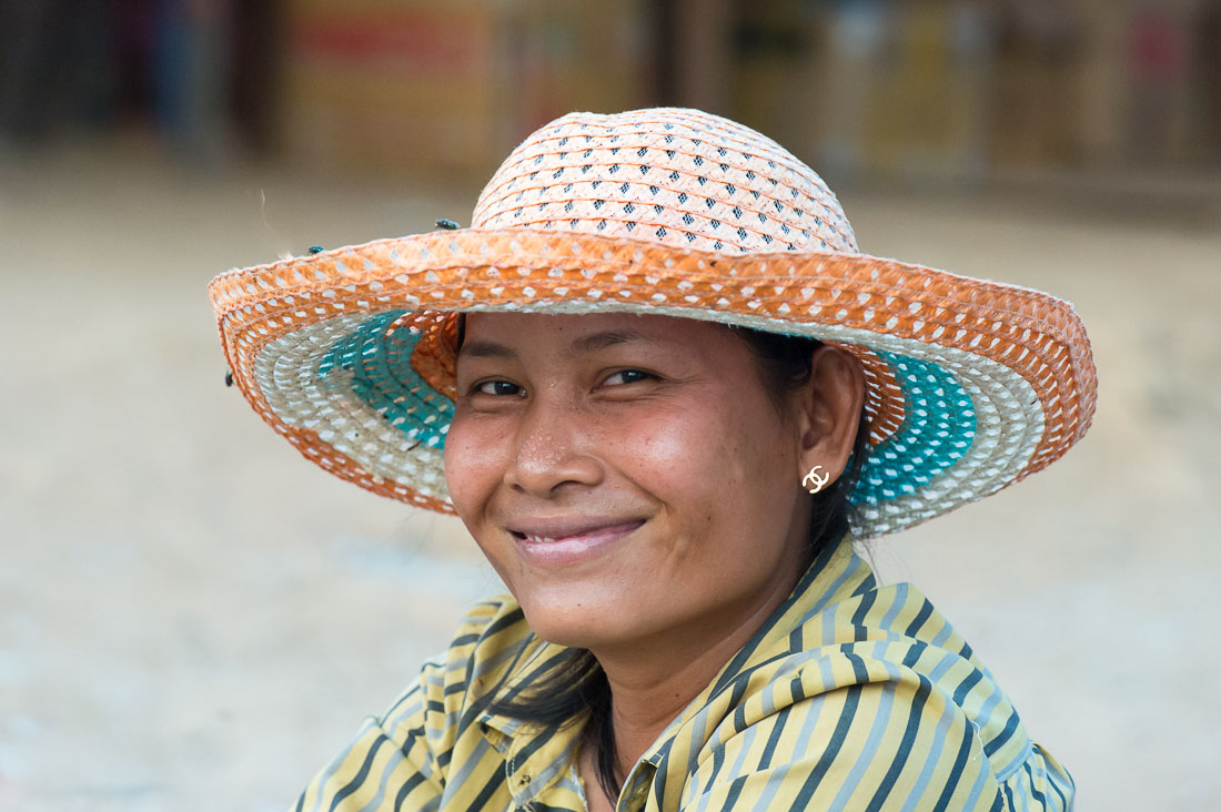 Beautiful woman smiling at the Sra Em market, Siem Reap province. Kingdom of Cambodia, Indochina, South East Asia