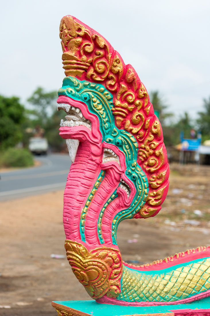 Bhuddist sacred figure, the snake, Naca, at the entrance of the pagoda (temple). Kingdom of Cambodia, Indochina, South East Asia