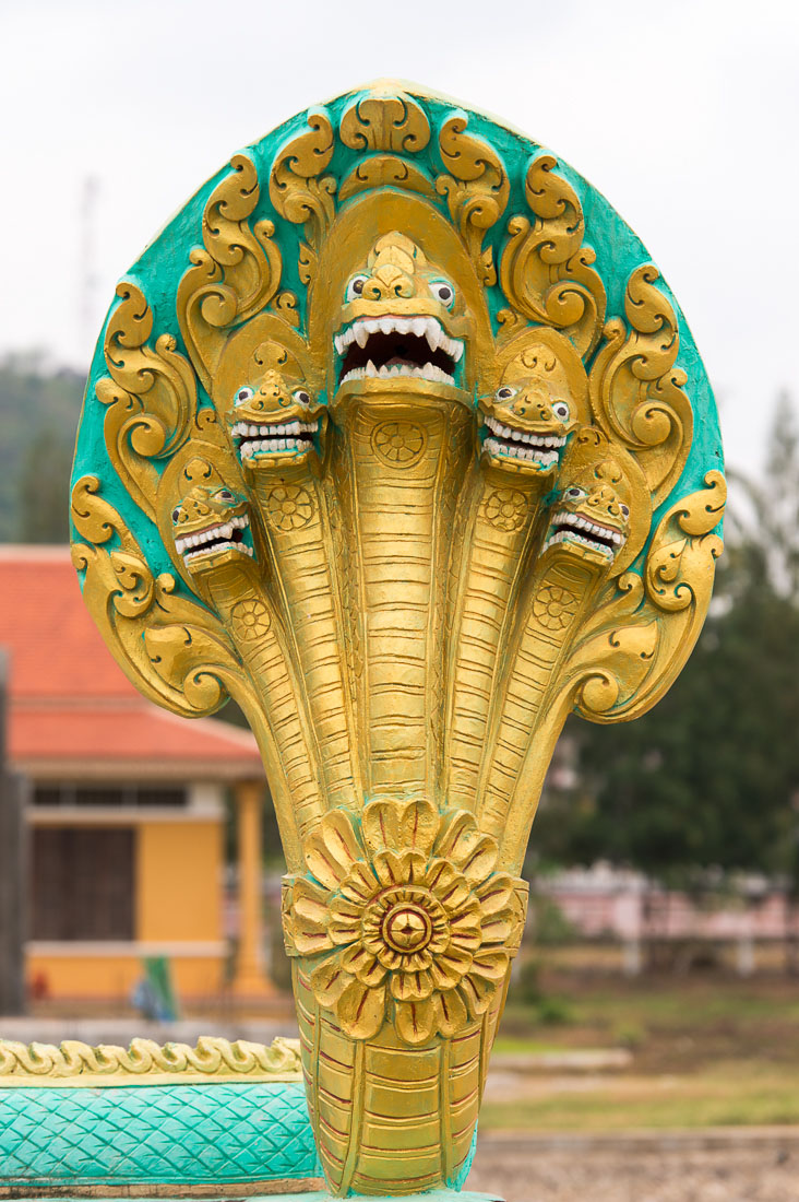 Bhuddist sacred figure, the snake, Naca, at the entrance of the pagoda (temple). Kingdom of Cambodia, Indochina, South East Asia