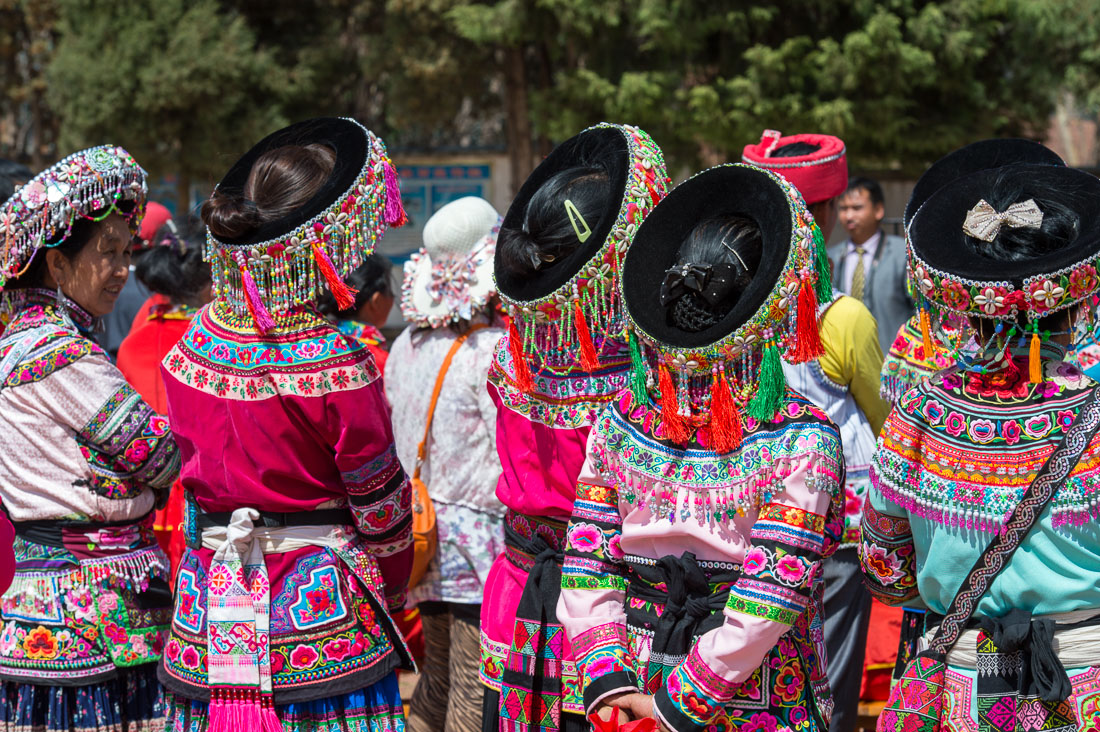 Women from the Miao ethnic minority people iwearing the traditional costume. Mao Jie village, Wuding County, Yunnan Province, China, Asia. Nikon D4, 24-120mm, f/4.0, VR