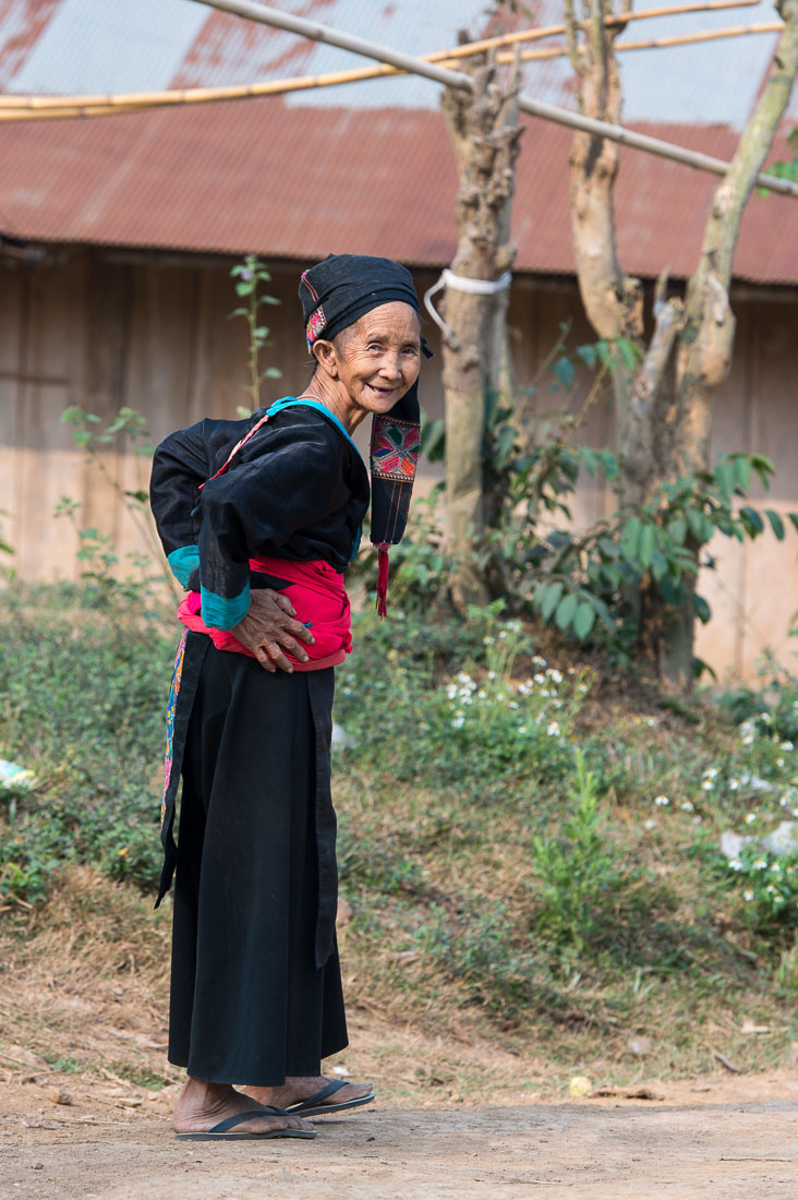 An old woman from the Black Hmong people ethnic minority, wearing her traditional costume, Ouay Xay district. Lao PDR,, Indochina, South East Asia