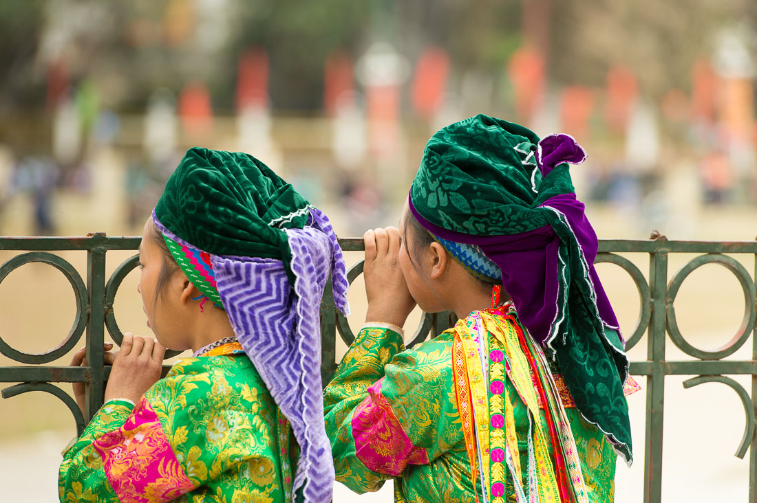 Young girls from the Black Hmong people ethnic minority, wearing traditional costume, Ha Giang province. Viet Nam, Indochina, South East Asia.