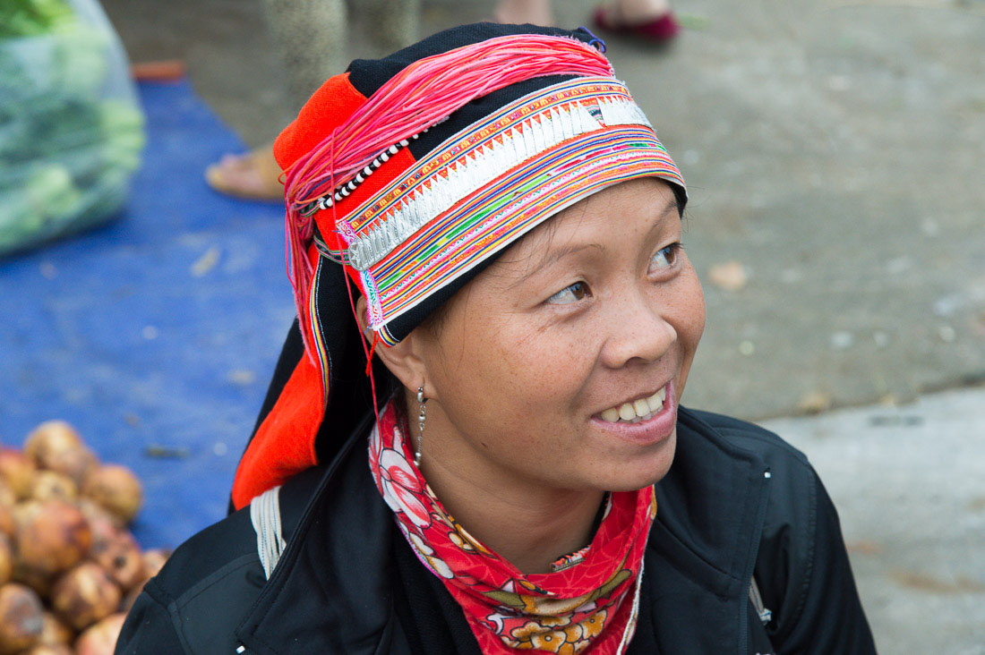 Woman from the San Chi people ethnic minority group, wearing traditonal clothes. Meo Vac market, Ha Giang province, Viet Nam, Indonesia, South East Asia