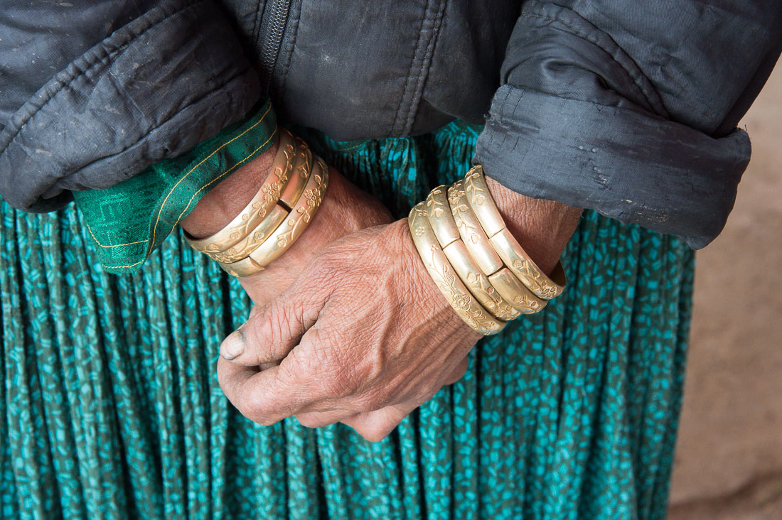 Copper bracelets worn by the Black Hmong people ethnic minority group, Dong Van market, Ha Gian Province, Viet Nam, Indochina, South East Asia