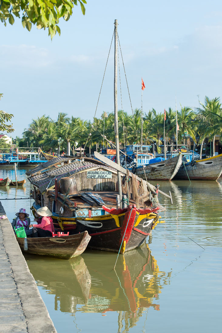 A typical river boat, now a floating bar serving fresh coffee and cold beers; Hoi An, Thu Bon river, Quang Nam province. Viet Nam, Indochina, South east Asia.