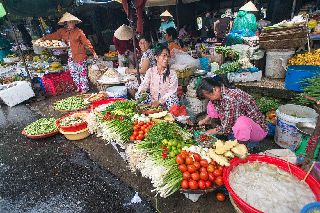 Vegetables vendors at Hue market, Thua Thien-Hue province. Viet Nam, Indochina, South East Asia.