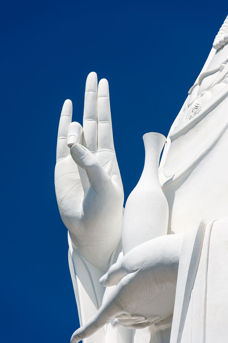 The hands of the colossal statue of the buddhist deity Bodhisattva, Da Nang, Viet Nam, Indochina, South East Asia.