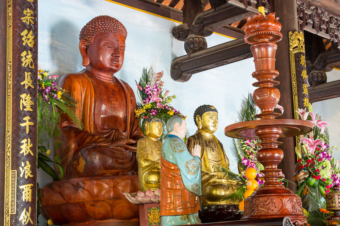 Wood carved statue of Buddha at To Dinh Chuc Thanh pagoda, Hoi An, Quang Nam province, Viet Nam, Indochina, South East Asia