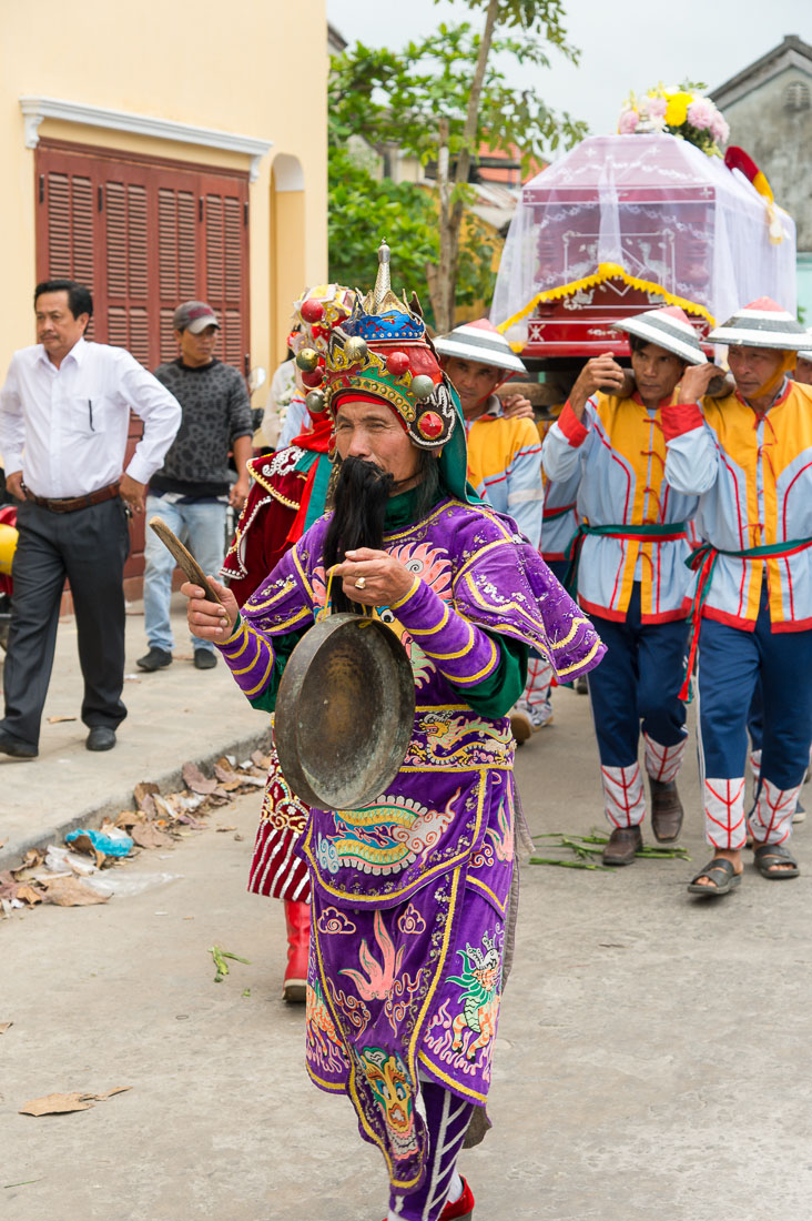 A master of a traditional Vietnamese funeral leading the palanquin with the coffin, Hoi An, Quang Nam province, Viet Nam, Indochina, South East Asia.